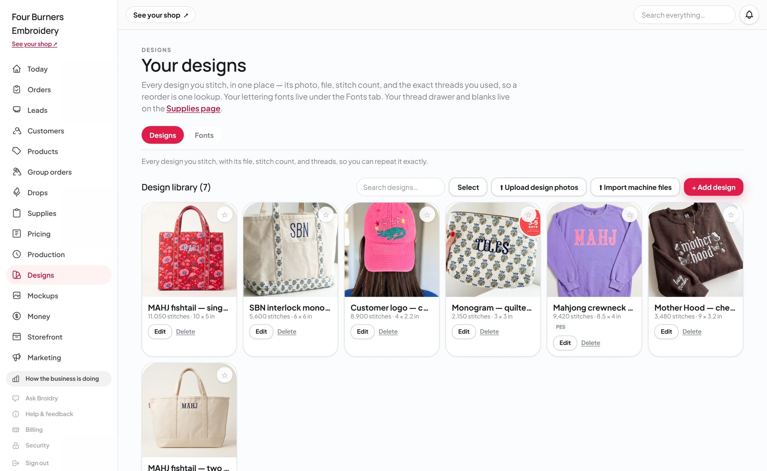 The design library: a grid of designs, each with its photo, stitch count, and true stitched size.